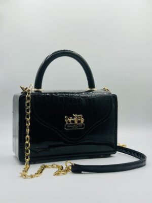 Coach Signature Handbag – Timeless Elegance